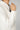 white cotton wool fabric end of roll tweed boucle jacket blazer casual formal smartwear businesswear queen collar frays fraying